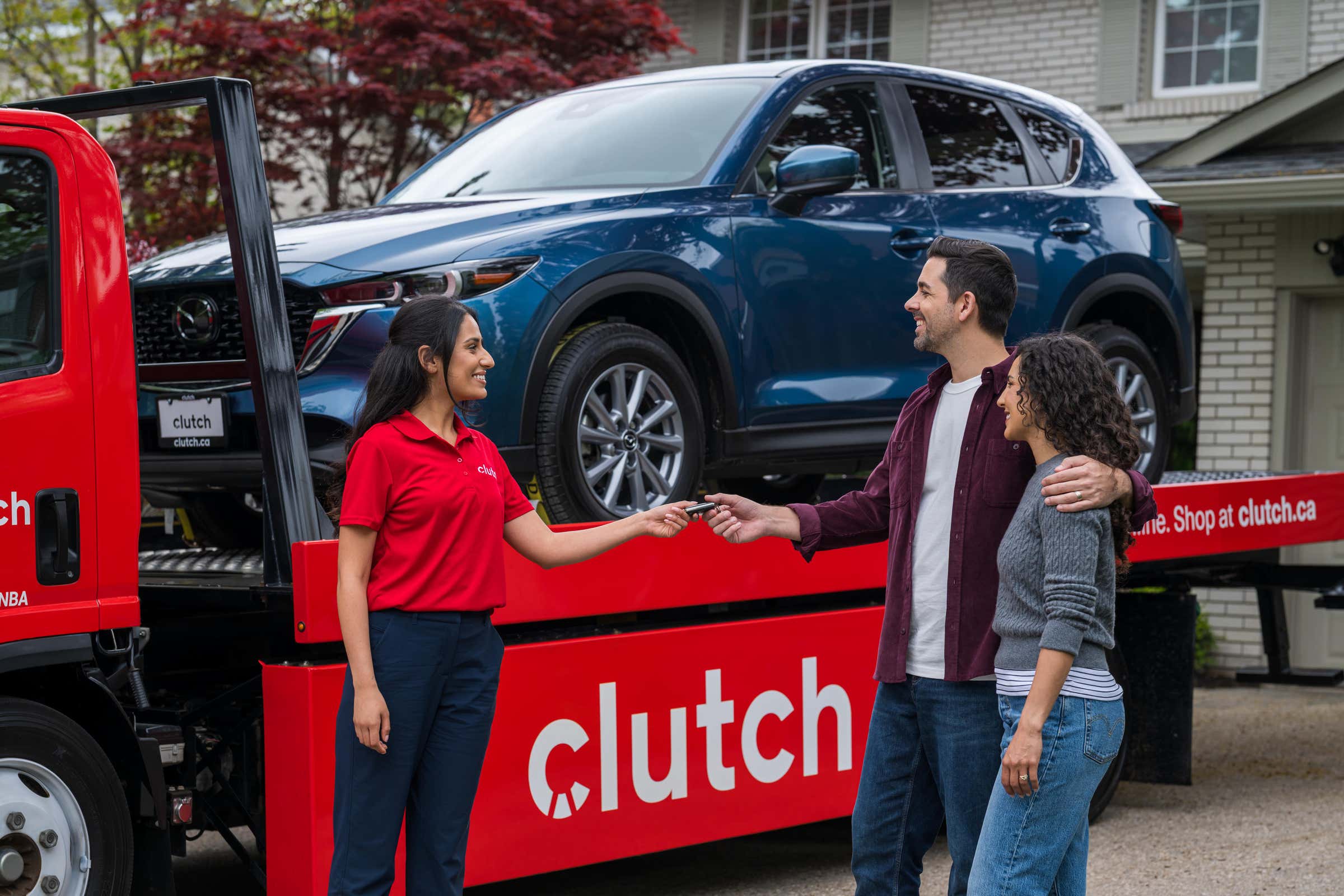 Handing over car keys at a Clutch pick-up
